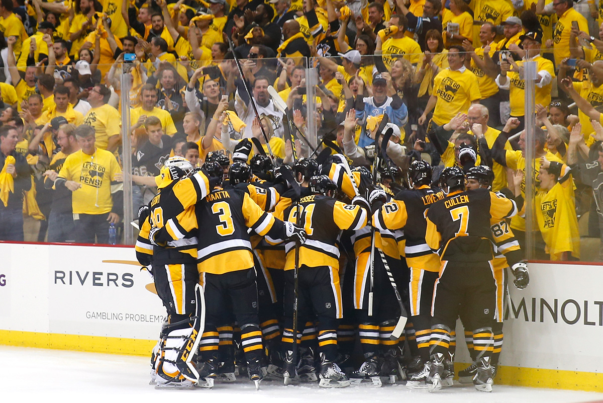 Conor Sheary of the Pittsburgh Penguins celebrates with teammates after scoring the game-winning goal to defeat the San Jose Sharks 2-1 during overtime in Game Two of the 2016 NHL Stanley Cup Final at Consol Energy Center on June 1, 2016 in Pittsburgh, Pennsylvania. 