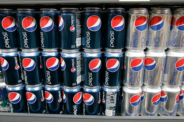 In this Monday, Feb. 9, 2009 file photo, Pepsi drinks sit on display at JJ&F Market in Palo Alto, Calif. 