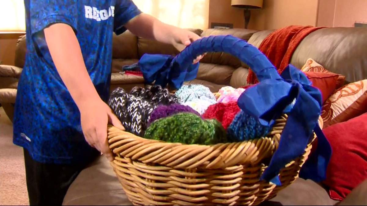 10-year-old knits hats for kids in hospital because he wants them to know they’re ‘loved’ - image