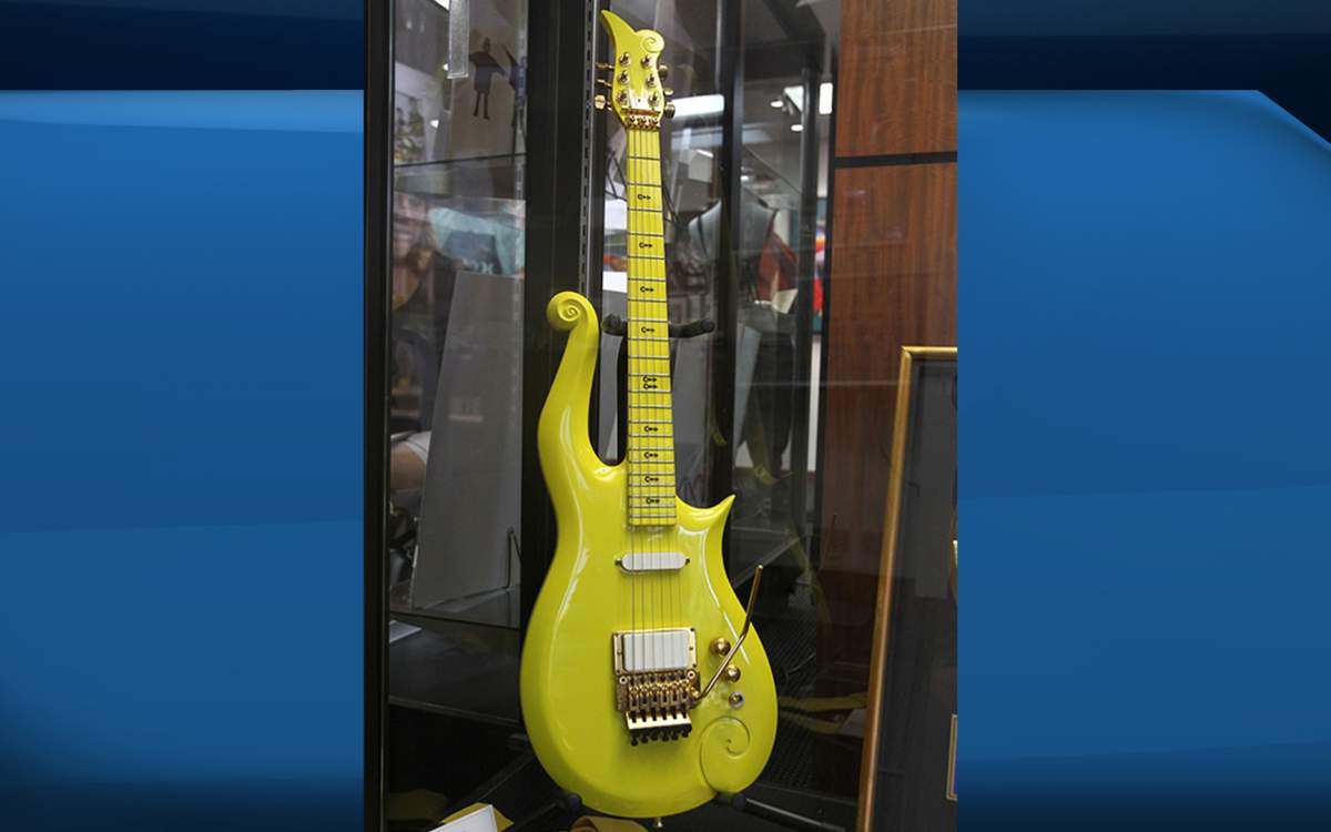 A Prince owned and played custom made signature yellow cloud guitar (Circa 1988-1994) is displayed during a media preview June 22, 2016 at Heritage Auctions in Beverly Hills, California. The guitar is one of the items offered in a live auction June 24-25. 