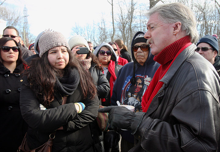 Sarnia Mayor Mike Bradley meets with people from Aamjiwnaang First Nation as a blockade of the CN St. Clair spur line that began Friday, continues in Sarnia, Ont., Sunday, December 23, 2012. 
