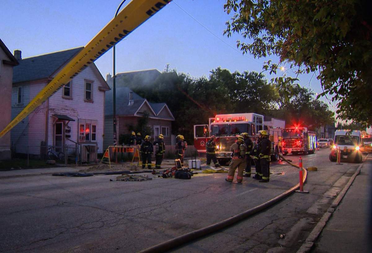 Fire crews tackles flames at this home on Selkirk Avenue early Tuesday morning.