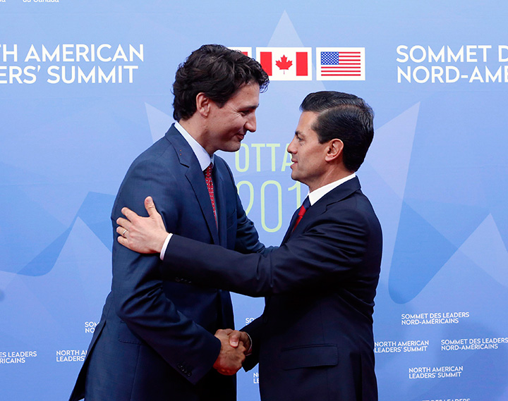 Prime Minister Justin Trudeau welcomes Mexican President Enrique Pena Nieto to the North American Leaders' Summit in Ottawa, Wednesday June 29, 2016. Canada and Mexico discussed reaching out to US president-elect Donald Trump about reworking NAFTA before publicly doing so.