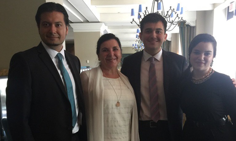 President Dr. Vianne Timmons with U of R students (l-r) Daniel Soto, Francisco Segura, and Ana Lucia Herrasti.