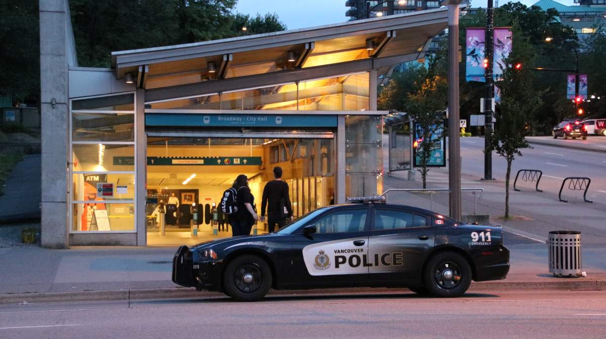 Vancouver Police outside the Broadway City SkyTrain Station.