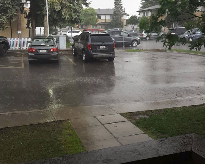 Heavy rain passes through Edmonton as a severe thunderstorm warning was in place Thursday, June 2, 2016.