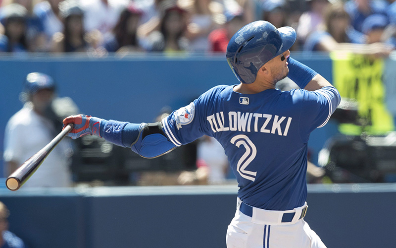 Toronto Blue Jays' Troy Tulowitzki hits a three-run home run against the Cleveland Indians during sixth inning American League MLB baseball action in Toronto on Sunday, July 3, 2016. 