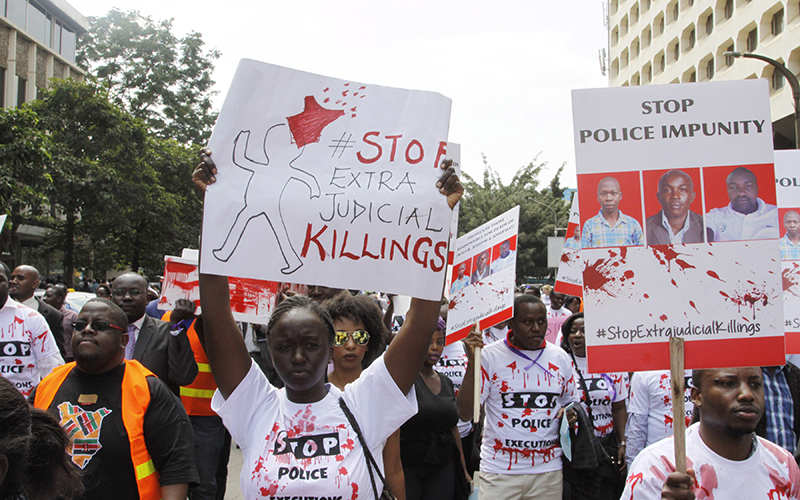 Hundreds of Kenyans including human rights activists, lawyers and taxi operators hold a peaceful protest in Nairobi, Kenya, against alleged pervasive killings and disappearances linked to police. Slain Kenyan human rights lawyer Willie Kimani and a taxi driver have been buried in their hometowns Saturday, July 9, amid calls for top officials to resign over police-linked extra-judicial killings. 