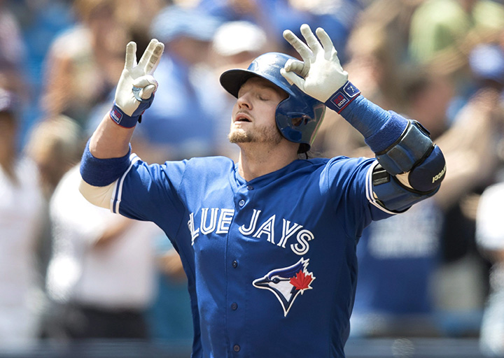 Toronto Blue Jays' Josh Donaldson crosses home plate after hitting a three-run home run against the Detroit Tigers in the fourth inning of their American League MLB baseball game in Toronto on Sunday, July 10, 2016.