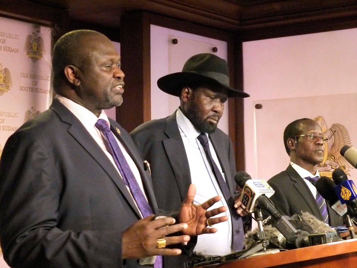 In this photo dated Friday July 8 2016, South Sudan Riek Machar, left. Salva Kiir, South Sudan President, and James Wani Igga, Vice president during a press conference at Presidential palace in Juba, South Sudan, after fighting started erupted when a group of unidentified soldiers tried to enter the palace.  Heavy explosions are shaking South Sudan's capital Juba Monday July 11, 2016 as clashes between government and opposition forces entered their fifth day, witnesses say, seeming to push the country back toward civil war. 