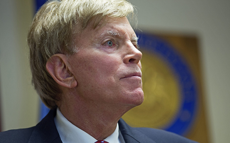 Former Ku Klux Klan leader David Duke talks to the media at the Louisiana Secretary of State's office in Baton Rouge, La., on Friday, July 22, 2016, after registering to run for the U.S. Senate, saying "the climate of this country has moved in my direction." .