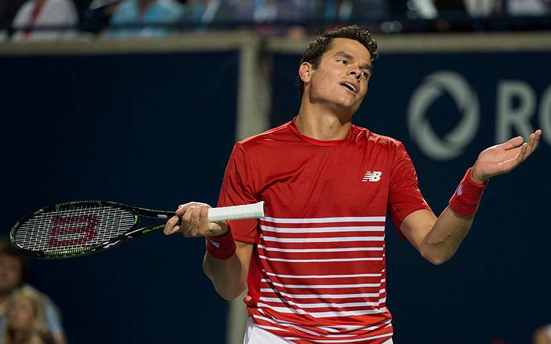 Milos Raonic of Canada reacts while playing against Gael Monfils of France during men's quarter-final Rogers Cup tennis action in Toronto on Friday, July 29, 2016. Raonic lost. 