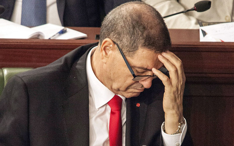 Prime Minister of Tunisia Habib Essid reacts during parliamentary session before the vote of confidence in Tunis, Tunisia, 30 July 2016. 