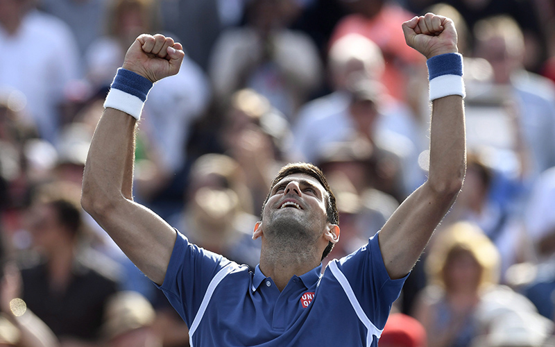 Novak Djokovic of Serbia celebartes his win over Kei Nishikori of Japan during men's Rogers Cup final tennis action, in Toronto on Sunday, July 31, 2016. 