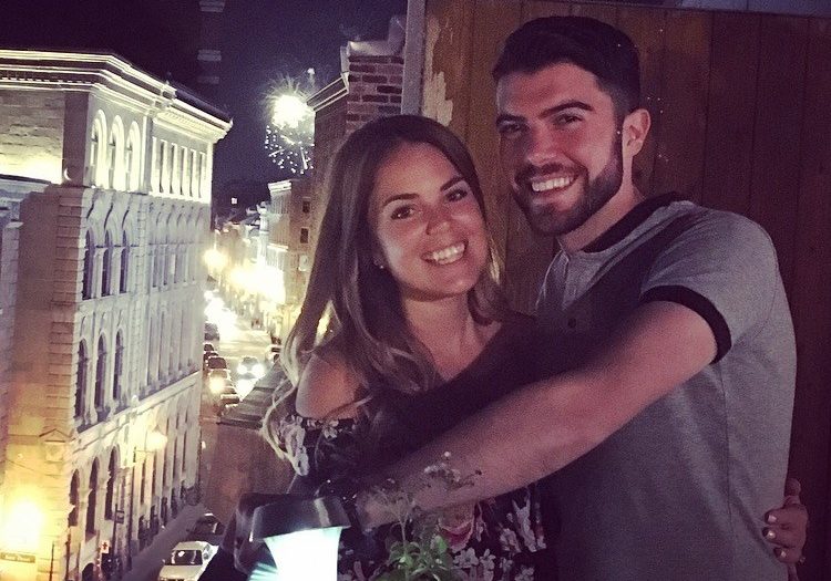 Matthew Schreindorfer and his wife, Katia Luciani, watch the fireworks in Montreal with friends.