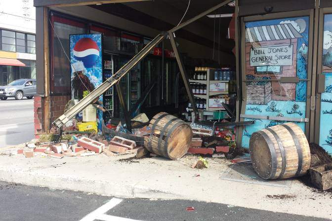 A driver smashed into the front window of a Kelowna supermarket in April, 2015, then fled the scene. A suspect has now been charged.