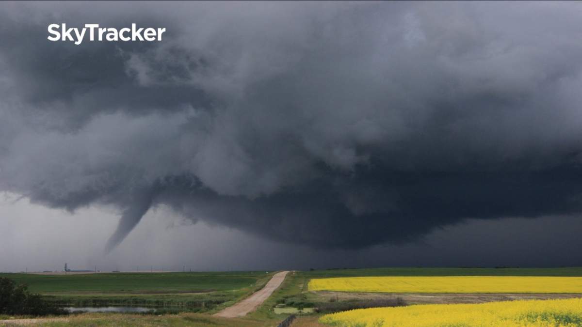 What appears to be a tornado touching down near Golden View Hutterite Colony at 3:57 p.m.