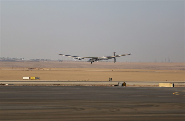 An experimental solar-powered airplane lands in Cairo, Egypt, Wednesday, July 13, 2016. The experimental aircraft, Solar Impulse 2, flew out of the Seville airport in Spain on Monday and landed in Cairo on Wednesday. 
