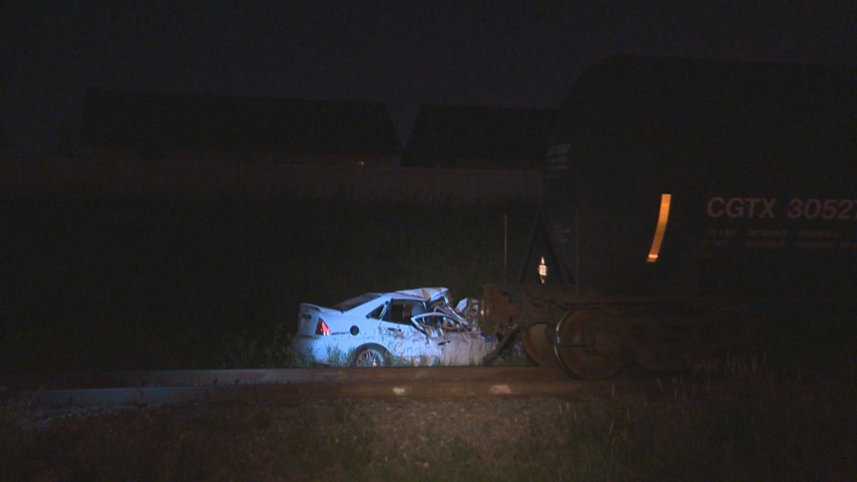 A car was driven into the side of a moving train near Fort Road and 153 Avenue in northeast Edmonton around 2 a.m. Wednesday. July 6, 2016.