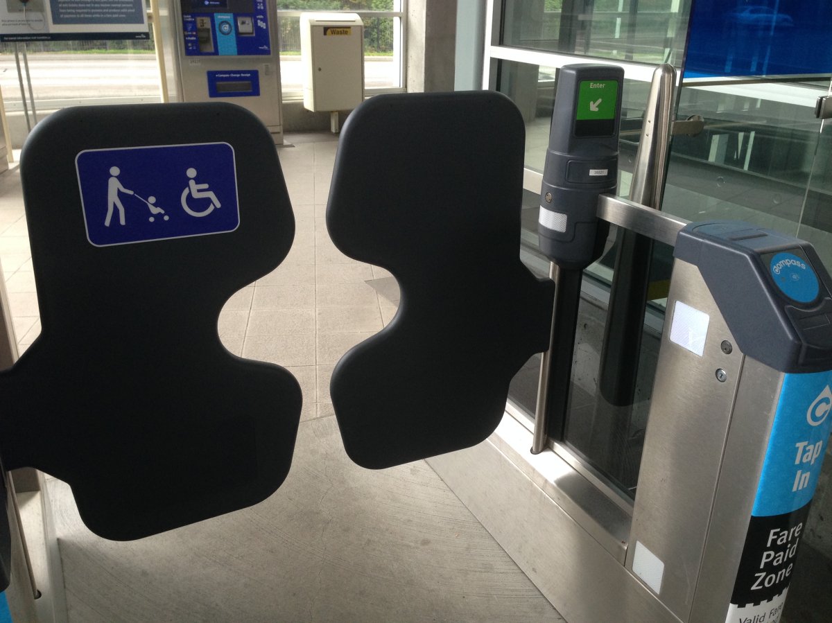 A wheelchair gate for Compass Card users at Lake City Way station in Burnaby.