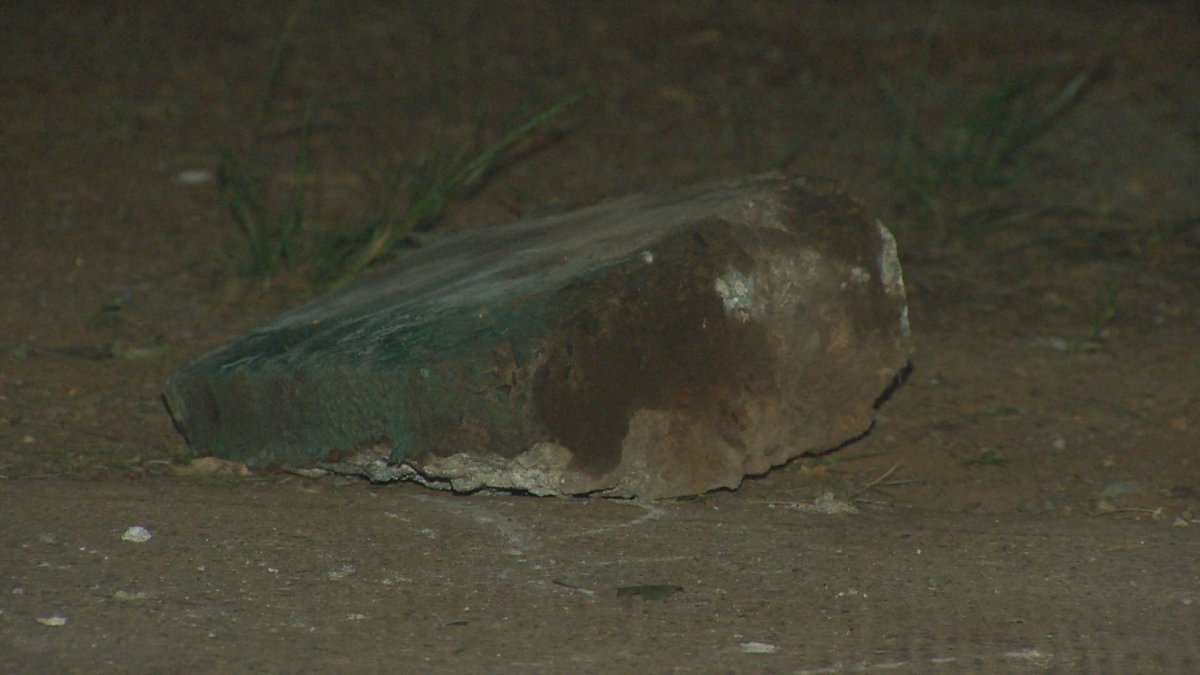 One of the chunks of concrete found on an Ashburn Avenue sidewalk under a Highway 102 overpass.