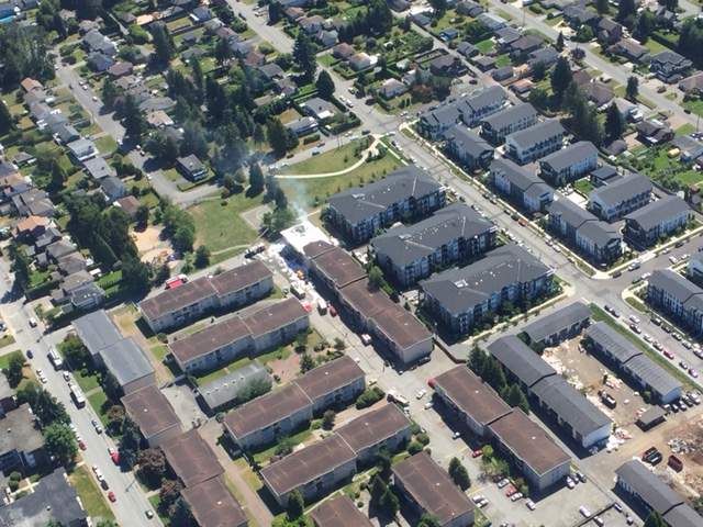 Fire at Coquitlam building displaces 50 Syrian refugees - image