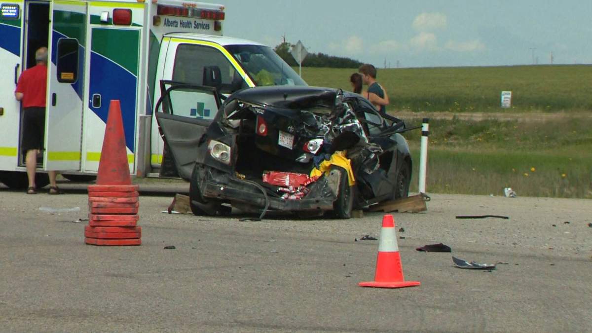 Emergency crews respond to a collision on Highway 564 and 84 Street N.E. on Wednesday, July 27, 2016. 