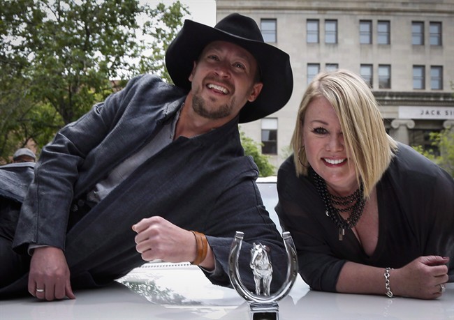 Paul Brandt, left, and Jann Arden will lead the Calgary Stampede parade, which goes July 8, after being named parade marshals during a ceremony in Calgary, Alta., Wednesday, June 8, 2016.