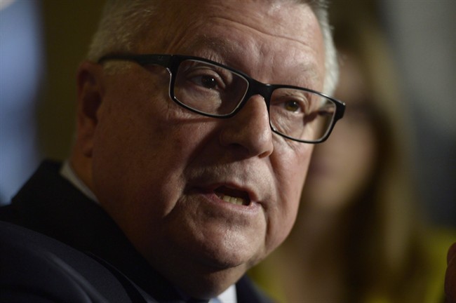Public Safety Minister Ralph Goodale speaks to the media in the House of Commons foyer on Parliament Hill in Ottawa in a June 16, 2016, file photo.