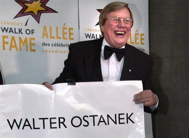 Walter Ostanek unveils his star at his induction into the Walk of Fame along King Street in Toronto on June 1, 2001. Canada's reigning "Polka King" is adding a lottery win to his list of accolades. Walter Ostanek has had a successful 60-year career, with three Grammy wins and the Order of Canada under his belt. Now he's also claiming the $1 million grand prize in the London, Ont. Dream Lottery. THE CANADIAN PRESS/J.P.Moczulski.