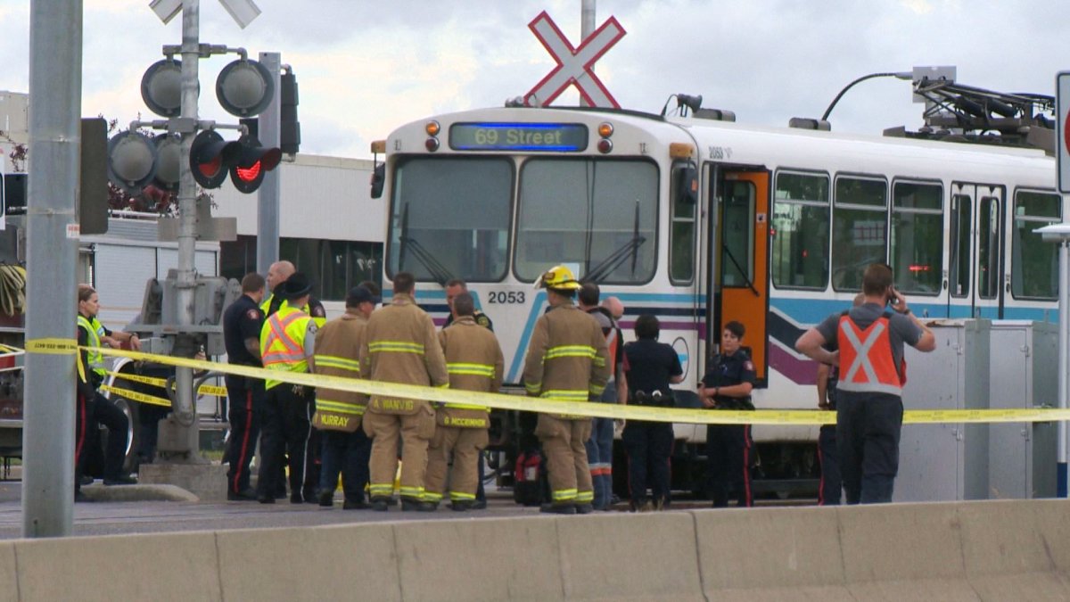 Emergency crews respond to the Whitehorn CTrain station in the 3000 block of 36 Street N.E. for a collision with a pedestrian on Sunday, July 10, 2016.