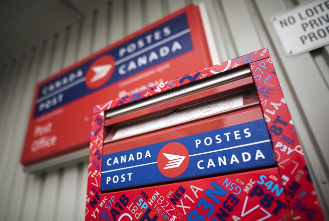 FILE: A mail box is seen outside a Canada Post office.