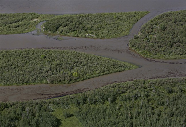 Oil is seen on the North Saskatchewan river near Maidstone, Sask on Friday July 22, 2016. 