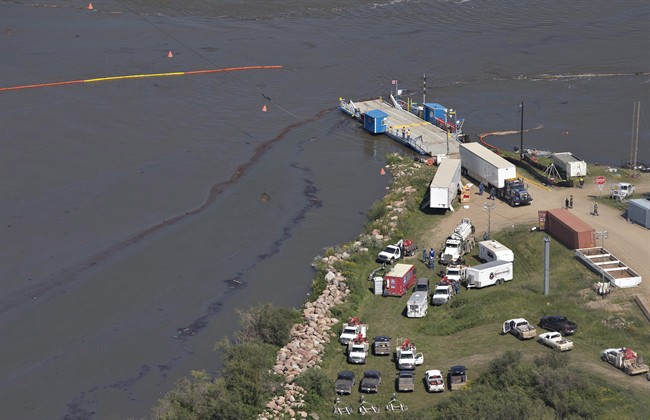 Crews work to clean up an oil spill on the North Saskatchewan River near Maidstone, Saskatchewan.