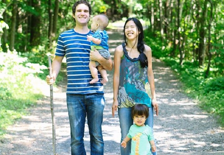 Simon Laporte with his wife, Pascale Vo, and their two children, Olivier and Simon. The couple created Oli & Bou, a company that designs clothes for children with dwarfism after Olivier was diagnosed.