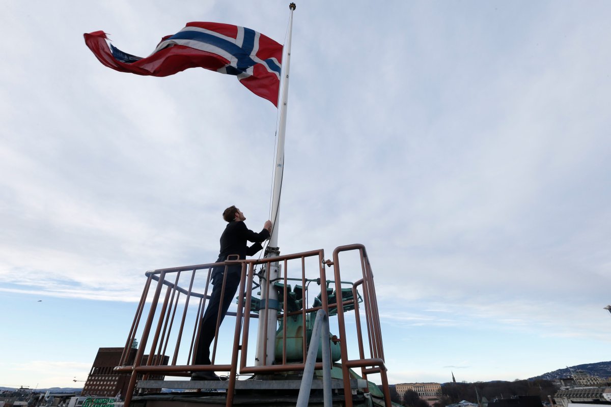 The Norwegian flag flies at half-mast as a mark of respect to former South African anti-apartheid icon Nelson Mandela, at the House of Parliament in Oslo, on December 6, 2013. 