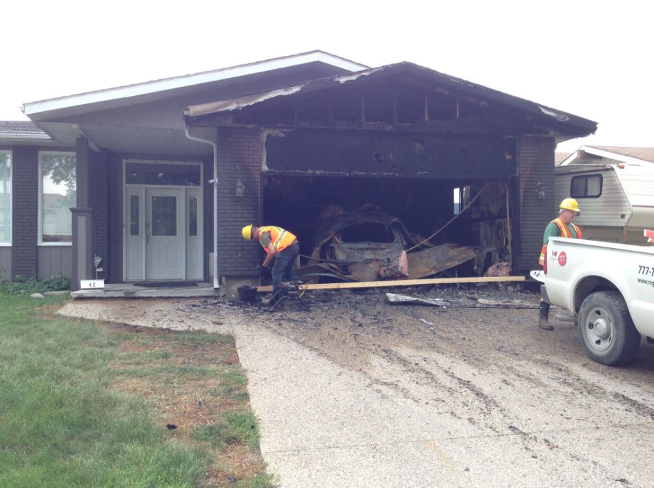 Garage fire causes major damage to home on Fletcher Place.