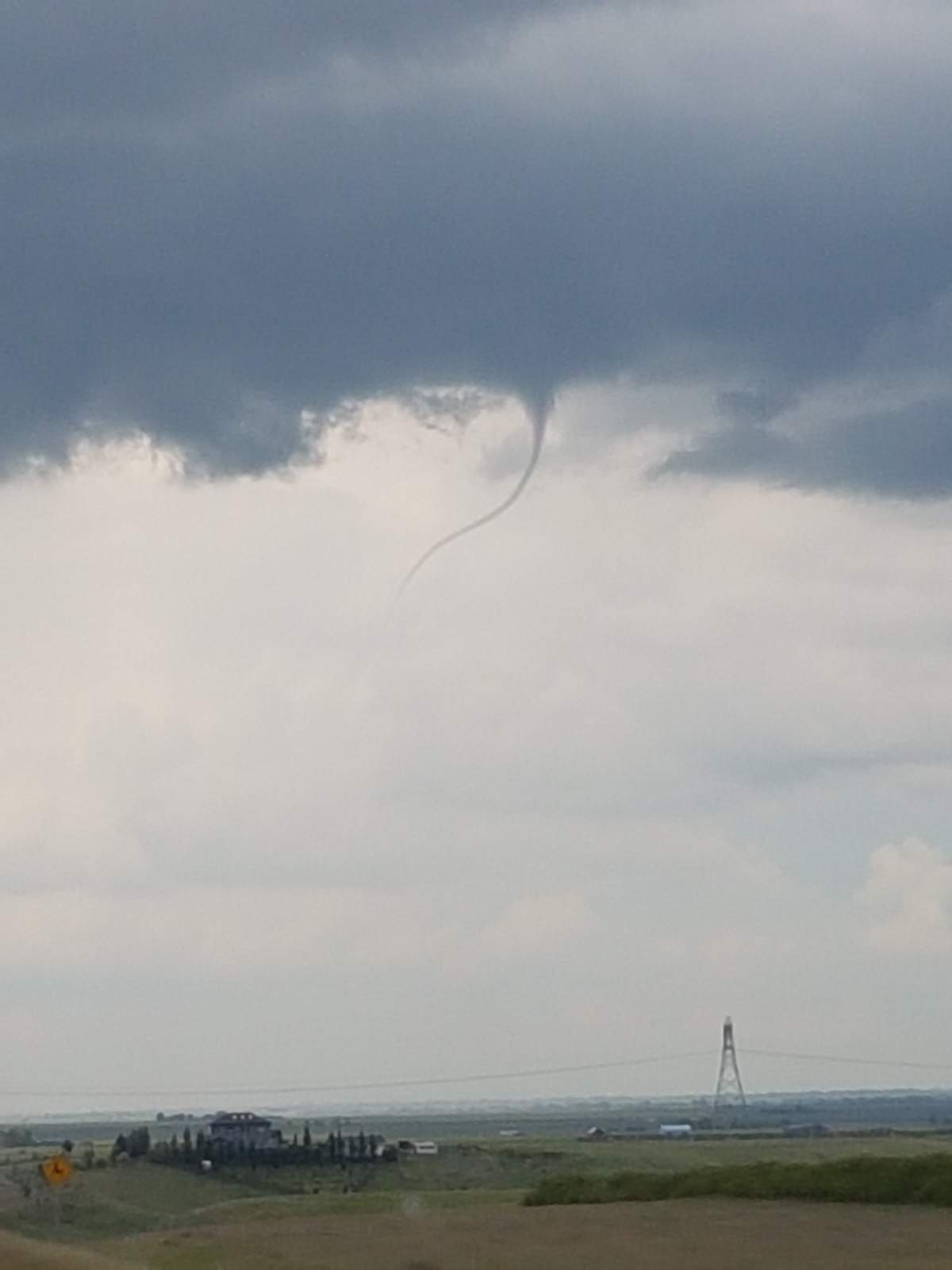Global Calgary viewer Scott Freilinger took this photo of funnel cloud forming near Irricana around 5:30 p.m.