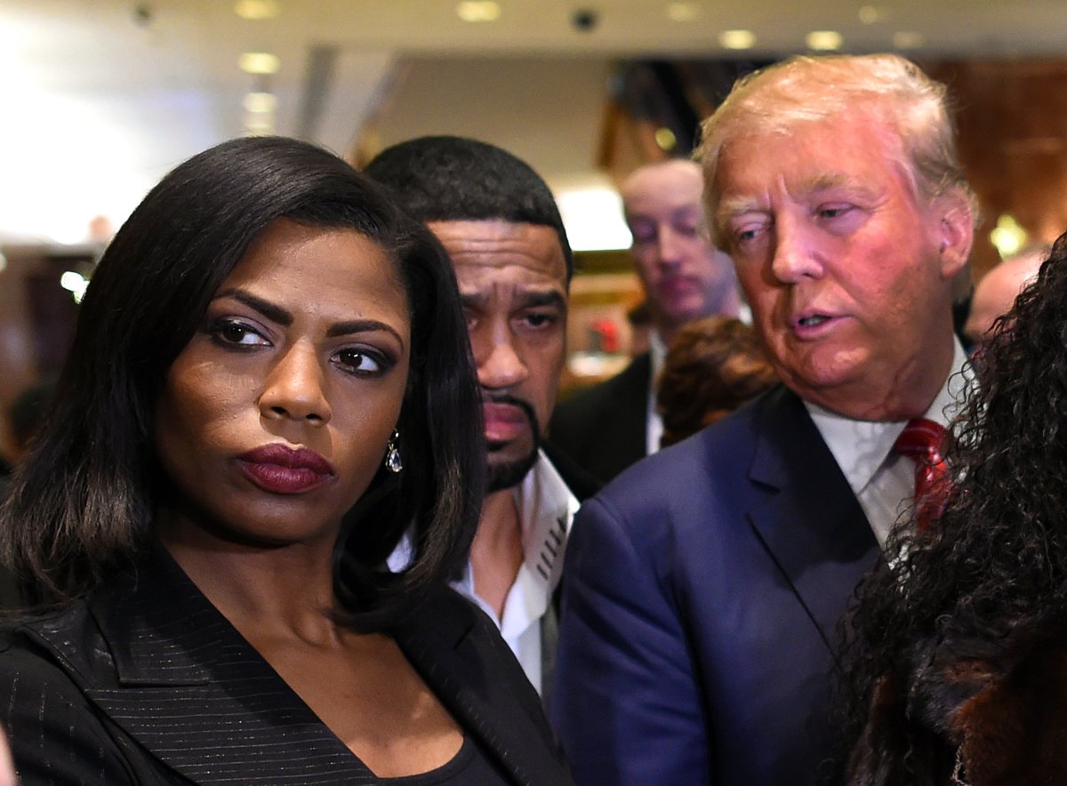 Omarosa Manigault, who was a contestant on the first season of Donald Trump's "The Apprentice" and is now an ordained minister, appears alongside Republican presidential hopeful Donald Trump during a press conference November 30, 2015  that followed Trump's meeting with African-American religious leaders in New York. 