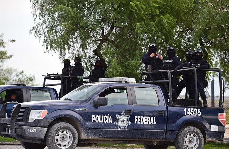 Patrols of the Mexican Federal police are pictured at the highway between Matamoros and Ciudad Victoria in Tamaulipas State. 
