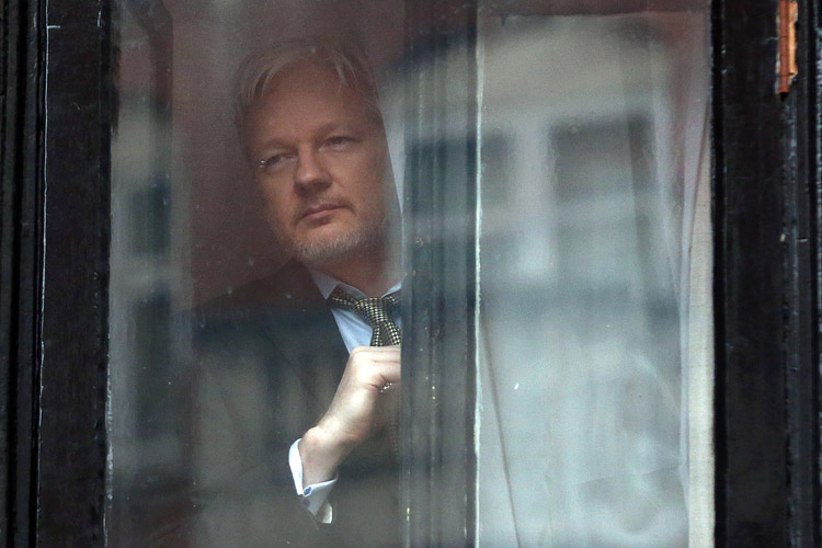 Wikileaks founder Julian Assange prepares to speak from the Ecuadorian embassy on February 5, 2016 in London, England. 