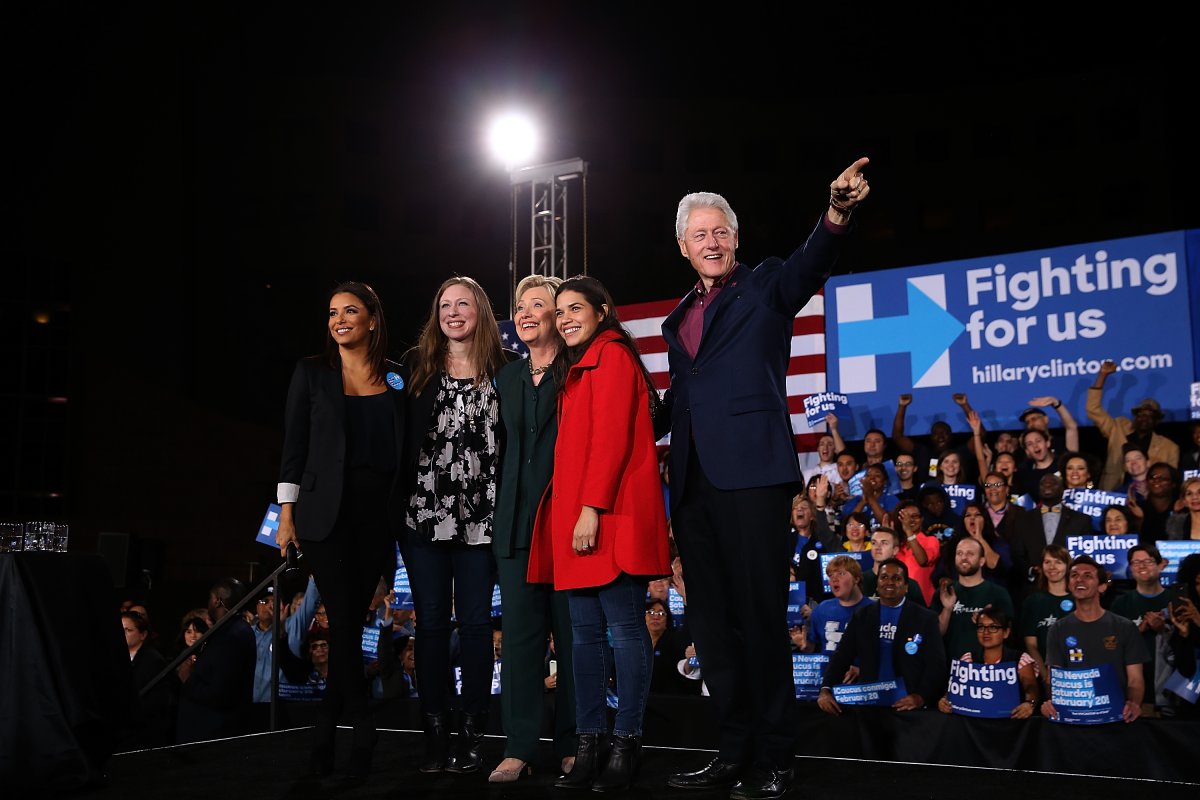 (L-R) Actress Eva Longoria, Chelsea Clinton, Democratic presidential candidate former Secretary of State Hillary Clinton, actress America Ferrera and former U.S. president Bill Clinton greet the crowd during a "Get Out The Caucus" at the Clark County Government Center on February 19, 2016 in Las Vegas, Nevada. 