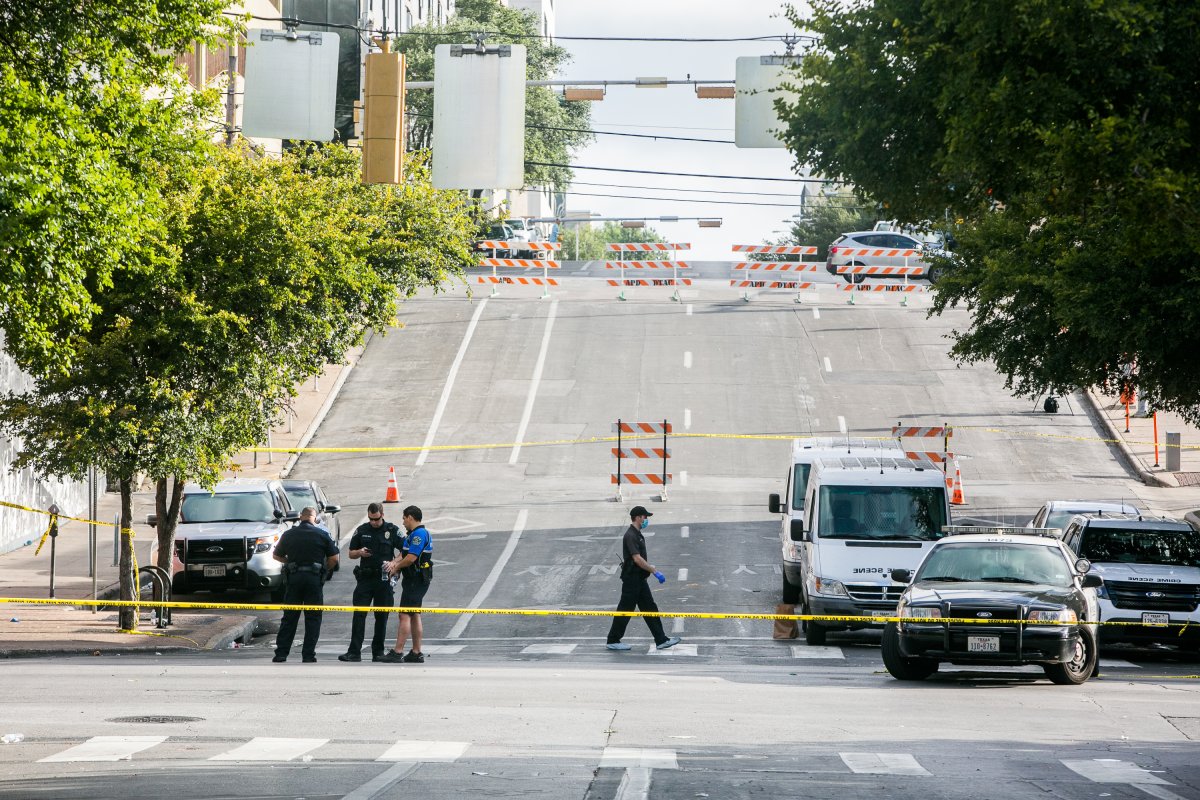 Police block off an area of 6th Street after two shootings July 31, 2016 in downtown Austin, Texas. Austin Police say shots rang out in the city's entertainment district around 2:17 a.m. 