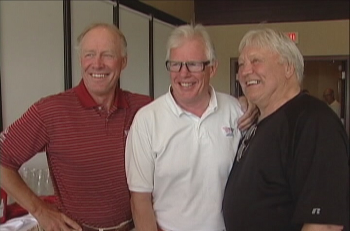 Anders Hedberg, Ulf Nilsson and Bobby Hull pose for pictures during a 'Hot Line' reunion in 2010.