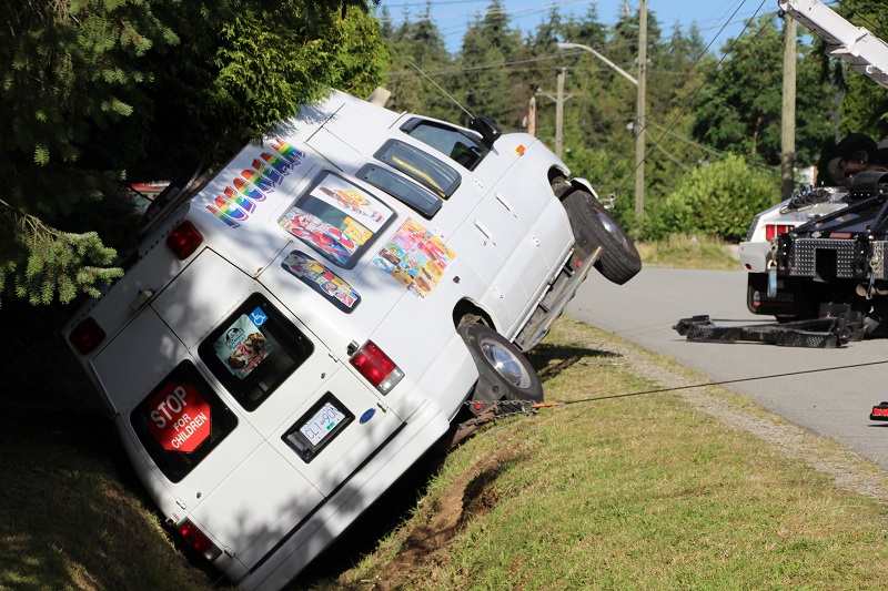 An ice cream truck in Surrey crashes on July 21, 2016. 