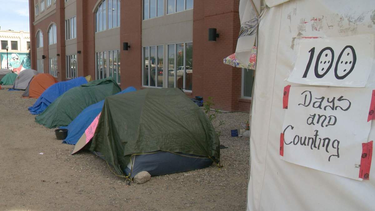 A sign at "Colonialism No More" camp outside  local INAC office displays new milestone.
