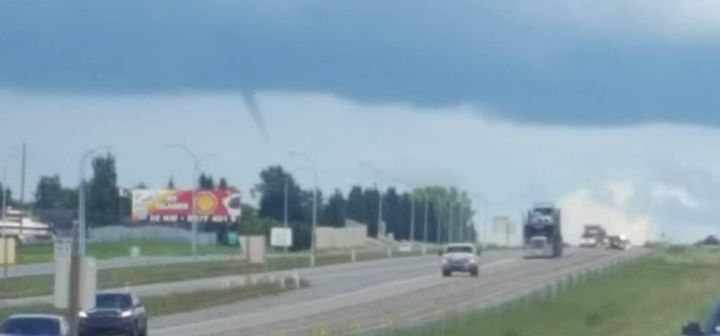 A funnel cloud is spotted near Innisfail, Alta. on July 16, 2016. (COURTESY: Thalia Nelder)