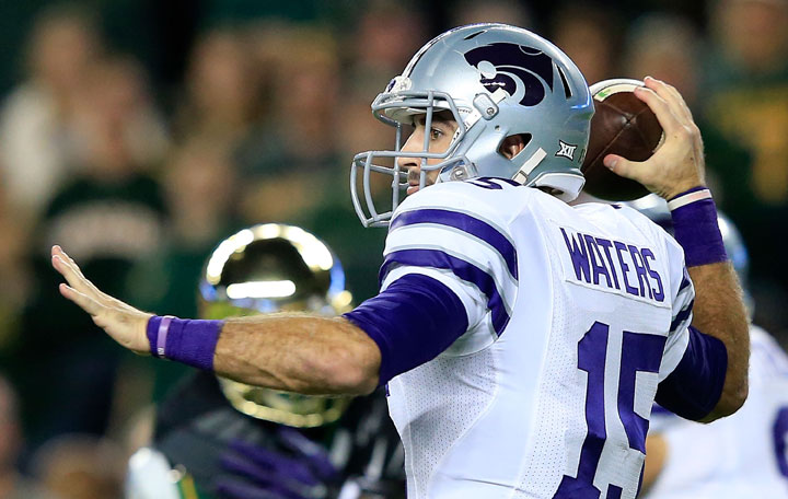 Jake Waters #15 of the Kansas State Wildcats passes against the Baylor Bears during the first half of the game on December 6, 2014 at McLane Stadium in Waco, Texas. (Photo by Jamie Squire/Getty Images)