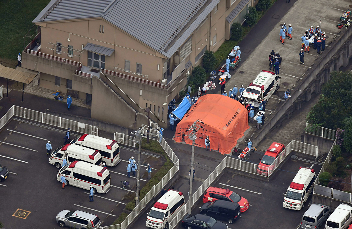 An aerial view shows emergency members at the Tsukui Yamayuri Garden, a residential care facility for disabled people in Sagamihara, Kanagawa Prefecture, about 40 km west of Tokyo, Japan, 26 July 2016.