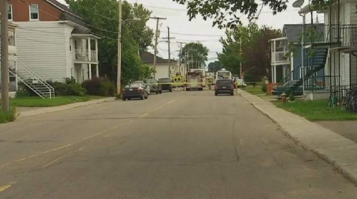 Police are at the scene of a tense standoff on St-Germain Street in Jonquière, Quebec on Saturday, July 9, 2016.